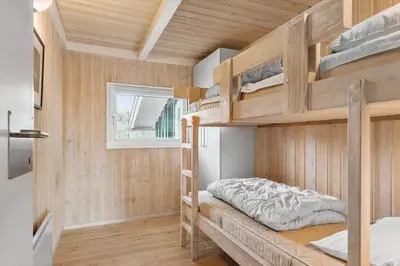 a bedroom with bunk beds in a house at BL161-Saltum-Taarnfalkevej-16 in Saltum