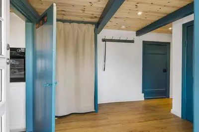 an empty room with a curtain and a door at BL1249-Pandrup-Rodhus-Klitvej-80 in Pandrup