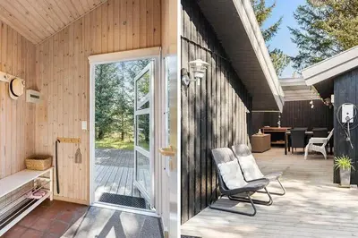 a patio with a chair and a sliding glass door at BL1293-Saltum-Havmandens-Vej-24 in Saltum