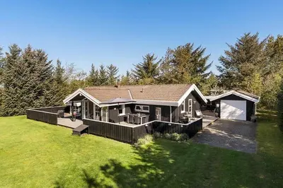 a home with a large yard with a house at BL1293-Saltum-Havmandens-Vej-24 in Saltum