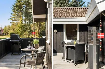 a patio with a table and chairs on a deck at BL1293-Saltum-Havmandens-Vej-24 in Saltum