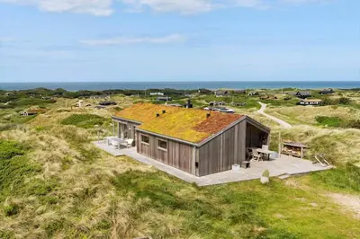 an overhead view of a small wooden house on the beach at BL1104-Saltum-Borgvej-45 in Saltum