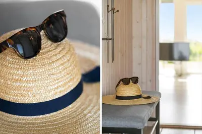 a hat and sunglasses on top of a table at 115-Harboore-Strandvejen-164 in Harboør