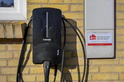 a black router is attached to a brick wall at 203-Harboore-Viktoriavej-3 in Harboør