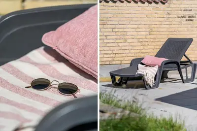 a chair and a blanket and a chair with sunglasses at 203-Harboore-Viktoriavej-3 in Harboør