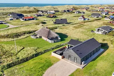 an aerial view of a small village with houses at 291-Harboore-Vejlby-Klit-34-B in Harboør
