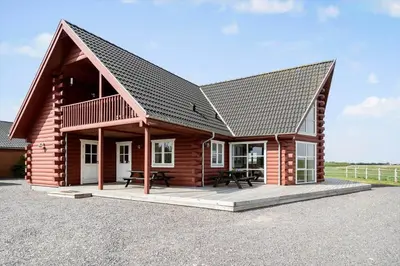 a log cabin with a gambrel roof at 289-Harboore-Strandvejen-179 in Harboør