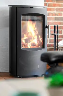 a television with a fire in a living room at G149-Lemvig-Porsevej-49 in Lemvig