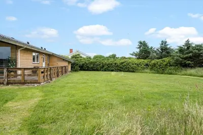 a large yard in front of a house at 294-Harboore-Neerlandiavej-102 in Harboør