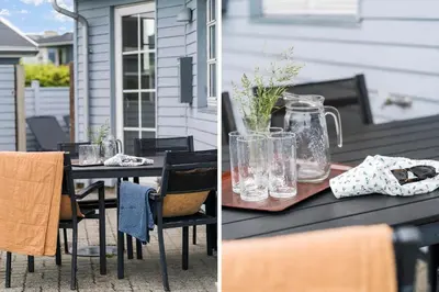 a table with glasses and a pitcher on a patio at G287-Lemvig-Bellisvej-87 in Lemvig