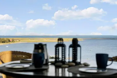 a table with a view of the water at G336-Lemvig-Myntevej-36 in Lemvig
