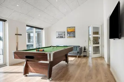 a living room with a pool table in it at 360-Harboore-Alkajavej-11 in Harboør