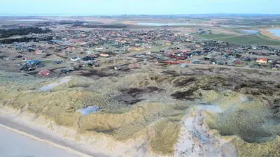 an aerial view of a parking lot on a mountain at 127-Harboore-Vejlby-Klit-237 in Harboør