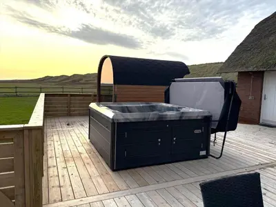 a large grill sitting on a deck on a roof at 181-Harboore-Vejlby-Klit-78 in Harboør