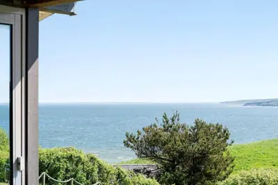a view of the ocean from a window at G319-Lemvig-Violvej-19 in Lemvig