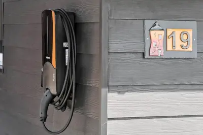 a door with a cord attached to a house at G219-Lemvig-Skovstjernevej-19 in Lemvig