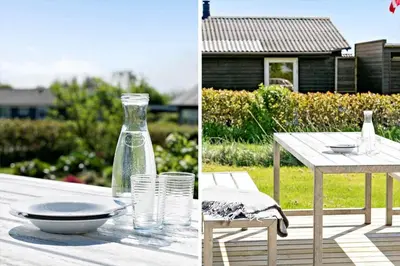 a table with a glass bottle and a table with a bowl at G219-Lemvig-Skovstjernevej-19 in Lemvig
