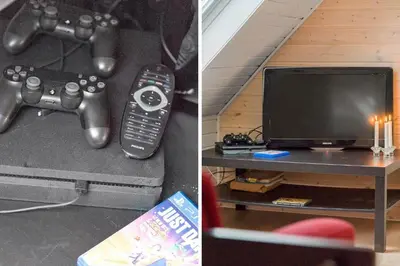 a remote control sitting on a table next to a tv at 370-Harboore-Strandvejen-53 in Harboør