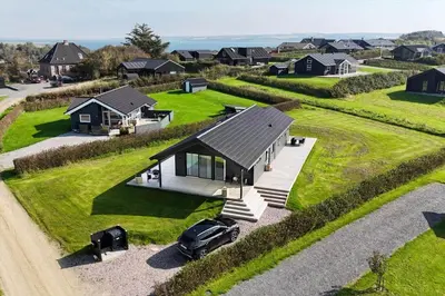 an overhead view of a house with a car parked in front at G104-Lemvig-Astersvej-4 in Lemvig