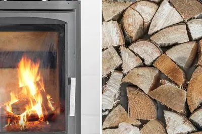 a fireplace and a pile of logs at G113-Lemvig-Nellikevej-13 in Lemvig