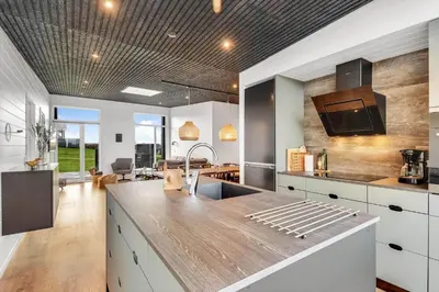 a kitchen with a sink and a counter top at G408-Lemvig-Violvej-8 in Lemvig