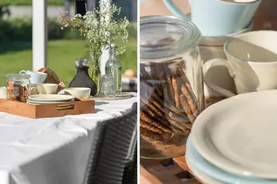 a table with white plates and a glass jar at G139-Lemvig-Porsevej-39 in Lemvig
