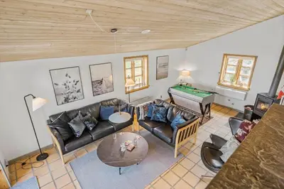 a living room with couches and a pool table at G217-Lemvig-Violvej-17 in Lemvig