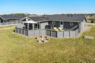 an aerial view of a house with a deck at 259-Harboore-Vejlby-Klit-129 in Harboør