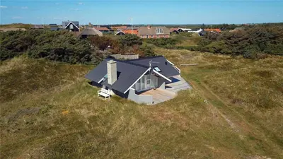 an overhead view of a house in a field at 108-Harboore-Merchantvej-10-C in Harboør
