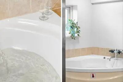 a bathroom with a sink and a bath tub at G124-Lemvig-Porsevej-24 in Lemvig
