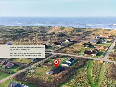 an aerial view of a house with a speed limit sign at 221-Harboore-Vejlby-Klit-221 in Harboør
