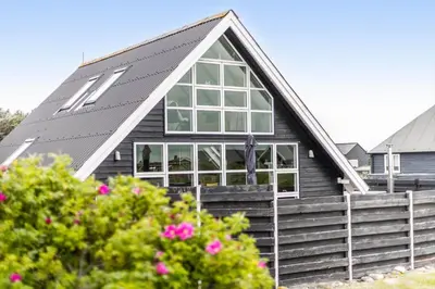a house with a gambrel roof with windows at 226-Harboore-Nautilusvej-5 in Harboør