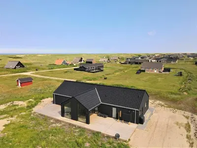 an overhead view of a black house in a field at 348-Harboore-Horizonvej-14 in Harboør