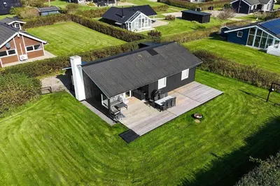an overhead view of a house on a grass field at G503-Lemvig-Bellisvej-3 in Lemvig