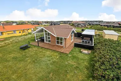 an overhead view of a house with a deck at 198-Harboore-Vejlby-Klit-209 in Harboør