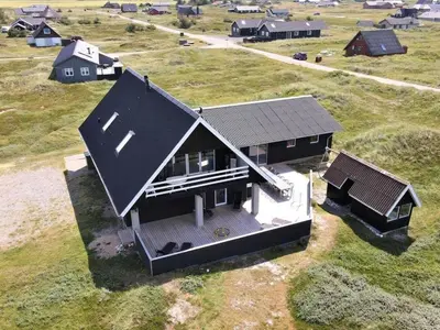 an overhead view of a house in a field at 328-Harboore-Lille-flyvholmvej-14 in Harboør