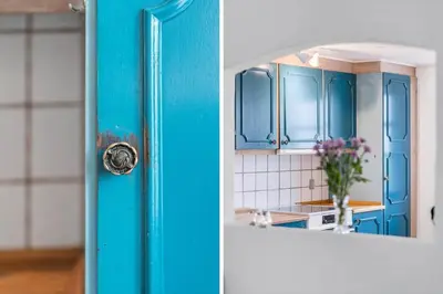 a blue door in a kitchen next to a counter at 369-Lemvig-Klostervej-39 in Lemvig
