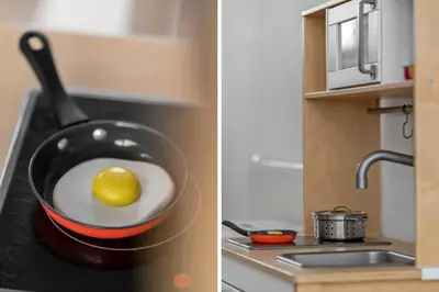 a frying pan with a lemon in it on a stove at 805-Harboore-Vejlby-klit-247 in Harboør