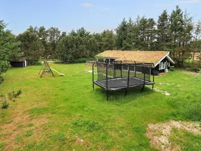 an aerial view of a yard with a house at 12 person holiday home in Saltum-By Traum in Saltum