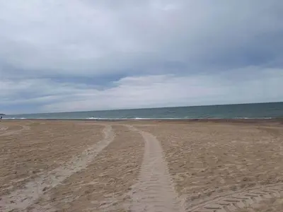 a tire tracks in the sand on a beach at 7 person holiday home in Fjerritslev-By Traum in Fjerritslev