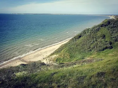 an aerial view of a beach next to the ocean at 6 person holiday home in Struer-By Traum in Struer