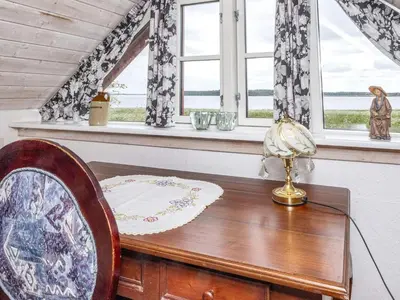 a desk in a room with a window at 6 person holiday home in Thisted-By Traum in Thisted