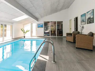 a large swimming pool in a living room at Luxury Retreat in Klitmoller - By Traum Ferienwohnungen in Thisted