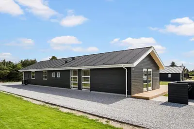 a modular home with a garage at BL1118-Saltum-Vesterhavs-Sletten-37 in Saltum