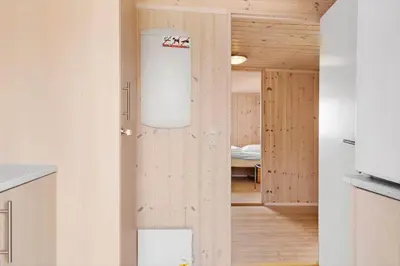 a room with a door leading to a bedroom at LF14194-Roslev-Bagvejen-26 in Roslev