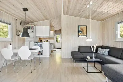 a living room with a couch and a table at LF101-Vestervig-Hellesvej-1 in Vestervig