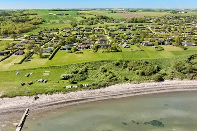 an aerial view of a resort on the beach at LF14038-Roslev-Stranddalen-119 in Roslev