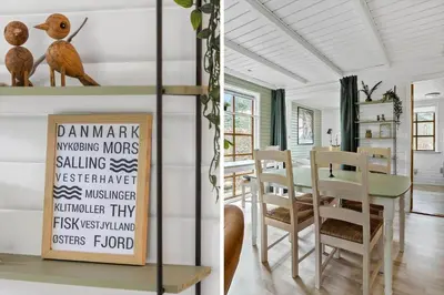 a kitchen and dining room with a table and chairs at LF14163-Roslev-Kybehuse-3 in Roslev