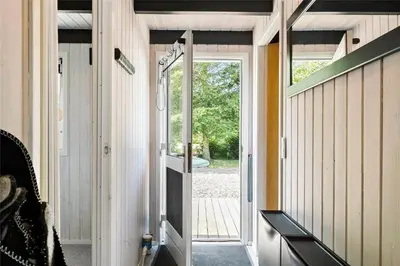 an open door to a room with a porch at LF12017-Spottrup-Albaekparken-144 in Spottrup