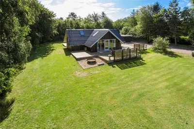 an aerial view of a small house in a field at LF12017-Spottrup-Albaekparken-144 in Spottrup
